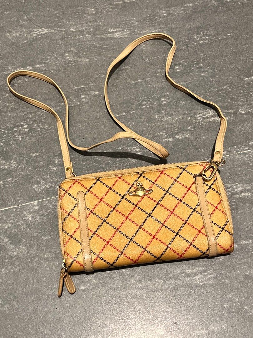 Vivienne P.P. Derby Sling Wallet (Category: Luxury Bags & Wallets) located in Rosario. Submitted by janineluxpreloved (Listing ID 1372677299, Image 1). Description: ❤️STILL AVAIL❤️ Will mark it as sold pag nabili na 😊 I have a derby bag of the same style and design, I can send you the pictures. I'm selling it separately for ₱7k fixed but will not post here, and can give this P.P. wallet to you for free. Anyway, this is a derby Vivienne Westwood 