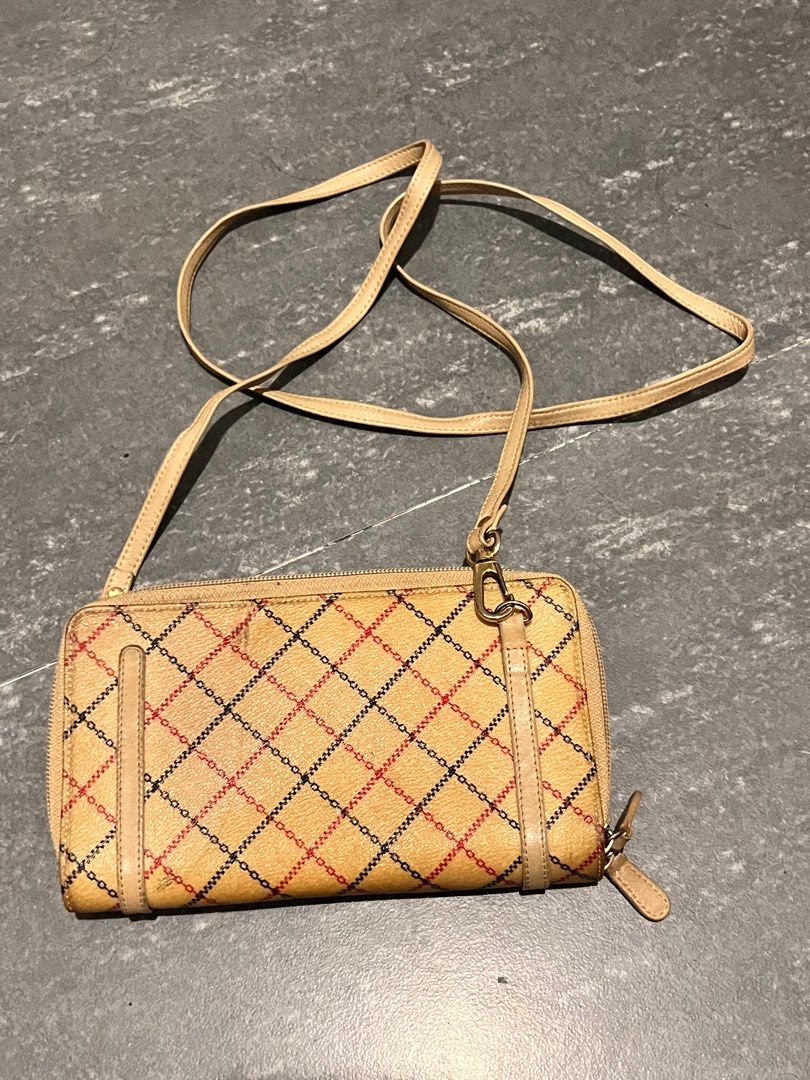 Vivienne P.P. Derby Sling Wallet (Category: Luxury Bags & Wallets) located in Rosario. Submitted by janineluxpreloved (Listing ID 1372677299, Image 2). Description: ❤️STILL AVAIL❤️ Will mark it as sold pag nabili na 😊 I have a derby bag of the same style and design, I can send you the pictures. I'm selling it separately for ₱7k fixed but will not post here, and can give this P.P. wallet to you for free. Anyway, this is a derby Vivienne Westwood 