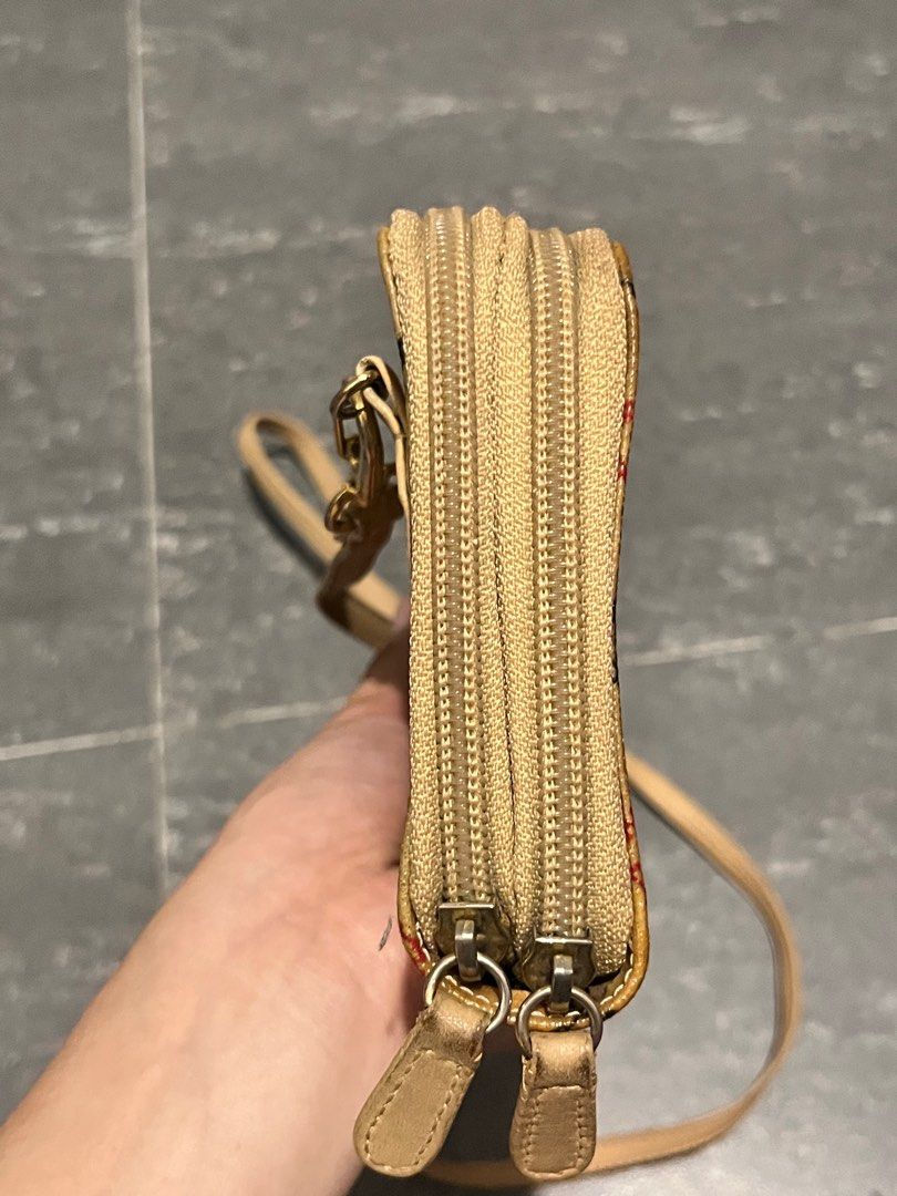 Vivienne P.P. Derby Sling Wallet (Category: Luxury Bags & Wallets) located in Rosario. Submitted by janineluxpreloved (Listing ID 1372677299, Image 3). Description: ❤️STILL AVAIL❤️ Will mark it as sold pag nabili na 😊 I have a derby bag of the same style and design, I can send you the pictures. I'm selling it separately for ₱7k fixed but will not post here, and can give this P.P. wallet to you for free. Anyway, this is a derby Vivienne Westwood 