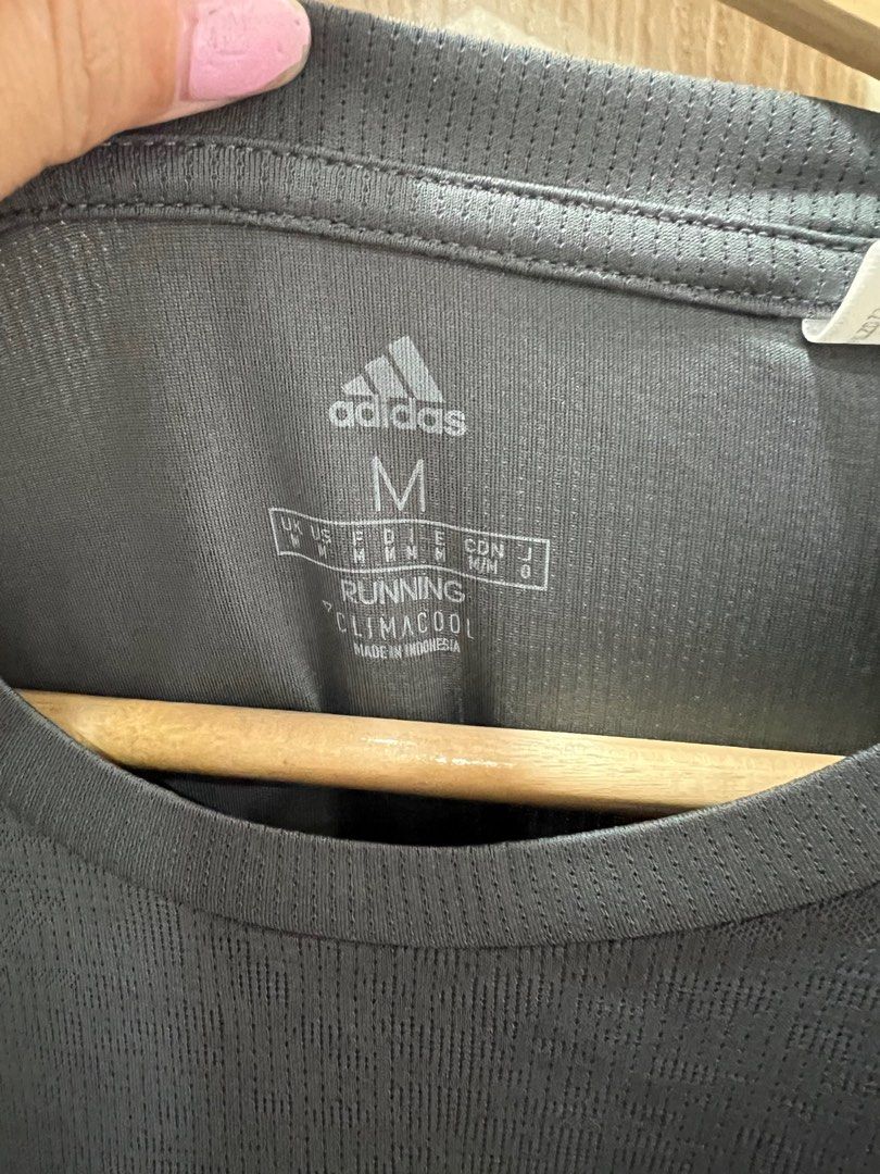 🍃Adidas Running Climacool Long sleeve shirt (Category: Activewear) located in Cavite. Submitted by shopclassph (Listing ID 1377830065, Image 3). Description: 🍃Adidas Running Climacool Long sleeve shirt 🍃❗️Needs washing❗️ 🍃Logo Intact 🍃ISSUE : May run ng thread 🍃With thumbhole 🍃Size on tag : M L-26” W-22” 400 🐈PS : Pls forgive my cat for the fur. Nagsasali sali nung nag picture ng mga damit 💆‍♀️ NO RUSH SHIPPING! SHIPPING ON WEEKENDS ONLY