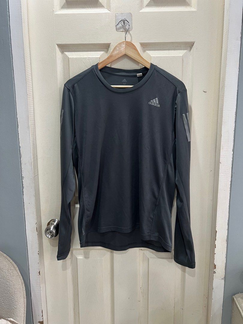 🍃Adidas Running Climacool Long sleeve shirt (Category: Activewear) located in Cavite. Submitted by shopclassph (Listing ID 1377830065, Image 1). Description: 🍃Adidas Running Climacool Long sleeve shirt 🍃❗️Needs washing❗️ 🍃Logo Intact 🍃ISSUE : May run ng thread 🍃With thumbhole 🍃Size on tag : M L-26” W-22” 400 🐈PS : Pls forgive my cat for the fur. Nagsasali sali nung nag picture ng mga damit 💆‍♀️ NO RUSH SHIPPING! SHIPPING ON WEEKENDS ONLY