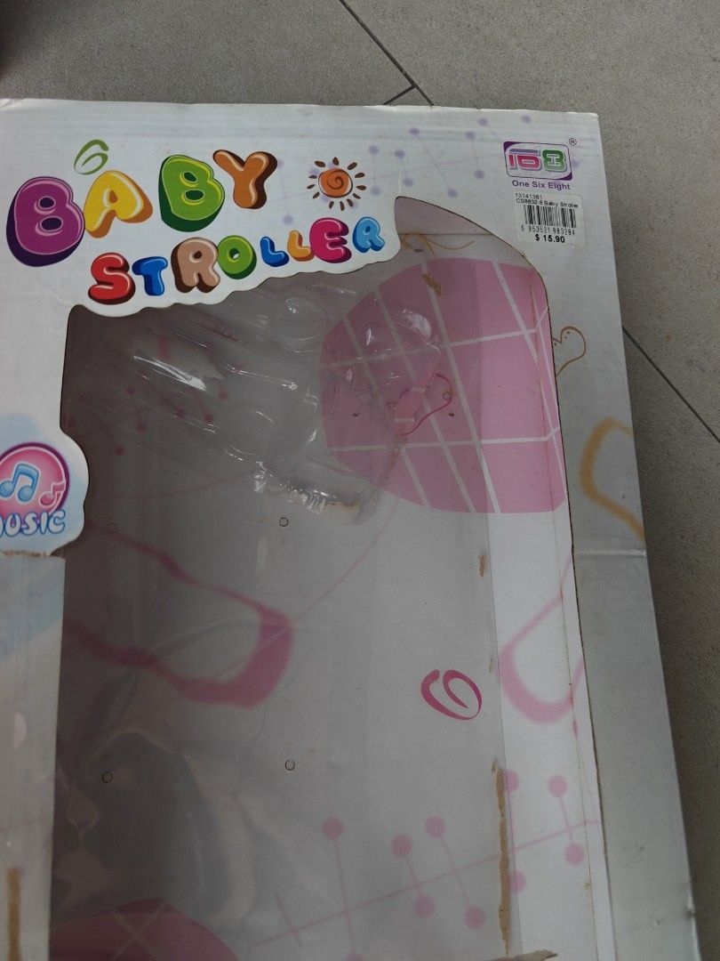 Baby's Happy Hour Toy Stroller. Pre love. Selling at $9 (Category: Strollers) located in Singapore. Submitted by Bien.loh.7 (Listing ID 1377826628, Image 3). Description: - Adorable pink and white toy stroller. - Features a handy storage pouch. - Includes original box (shows wear). - Ideal for imaginative play and doll adventures..