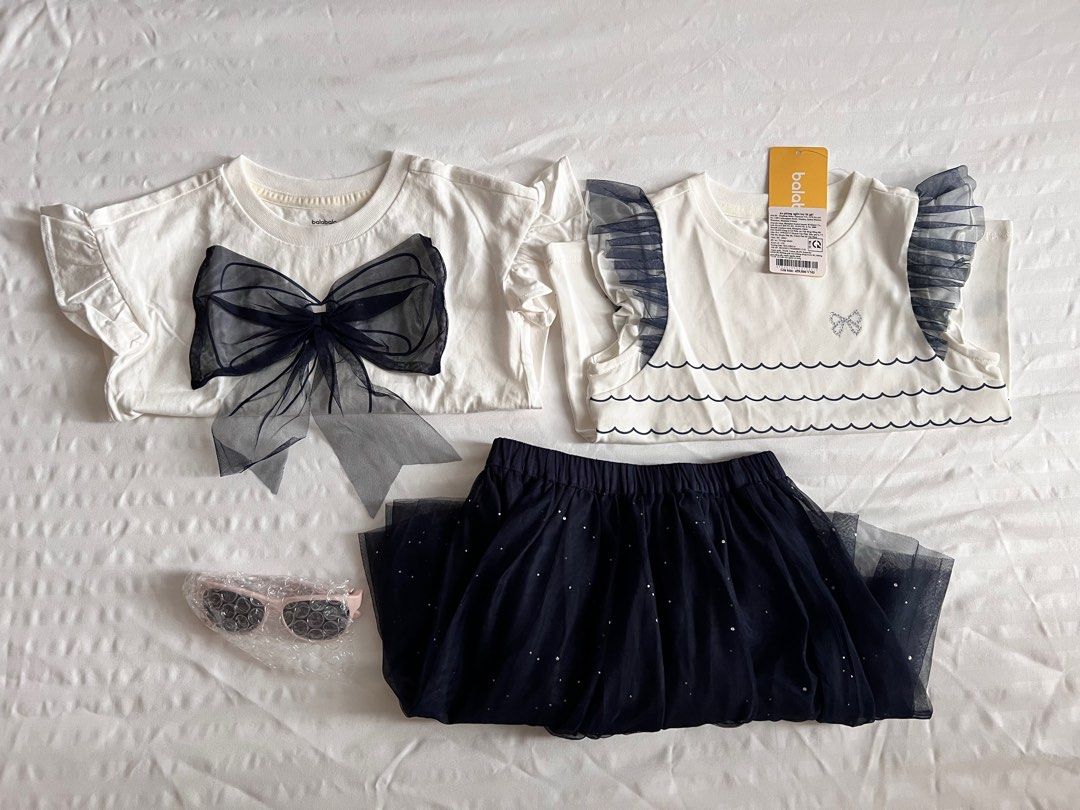balabala kids clothes [may swap with a book listed under Description] (Category: Babies & Kids Fashion) located in Singapore. Submitted by monjimiel (Listing ID 1377776921, Image 2). Description: One top is brand new and kept unused (still with tag). One top and the tulle skirt, brand new and used only once. Pink sunnies is freebie. Meetup: Holland Village MRT/Orchard MRT/Harbourfront MRT May swap with any of the following: •The Bell Jar (Harper 