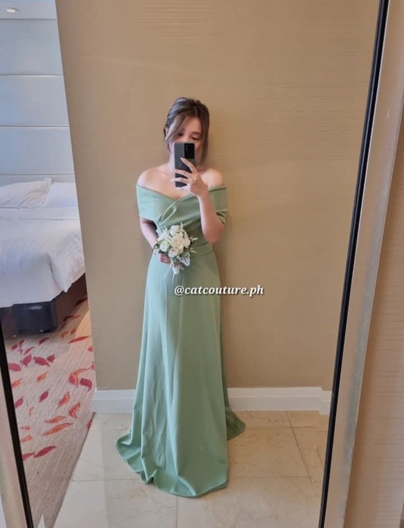 Bridesmaid Gown (Category: Evening dresses & gowns) located in Caloocan City. Submitted by manuzca (Listing ID 1377943474, Image 1). Description: From Cat Couture NEW/not used Size: Small Pa-sobra from our wedding Fabric: Neoprene Location: South Caloocan.