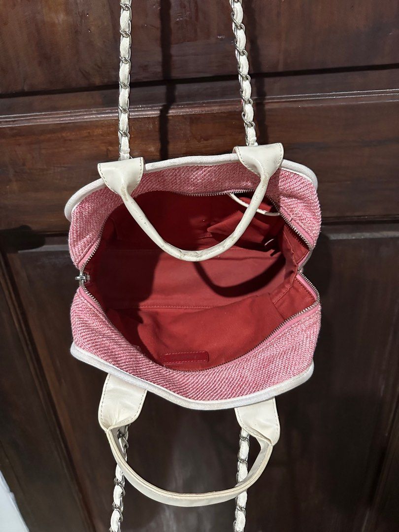 Chanel Bowling bag (Category: Luxury Bags & Wallets) located in Bulacan. Submitted by backdoor_gallery (Listing ID 1377854091, Image 3). Description: Preloved Chanel bowling satchel bag color pink Hand me down from a relative not sure about the authenticity Some damages on its handles Please see photos Rfs: need funds.