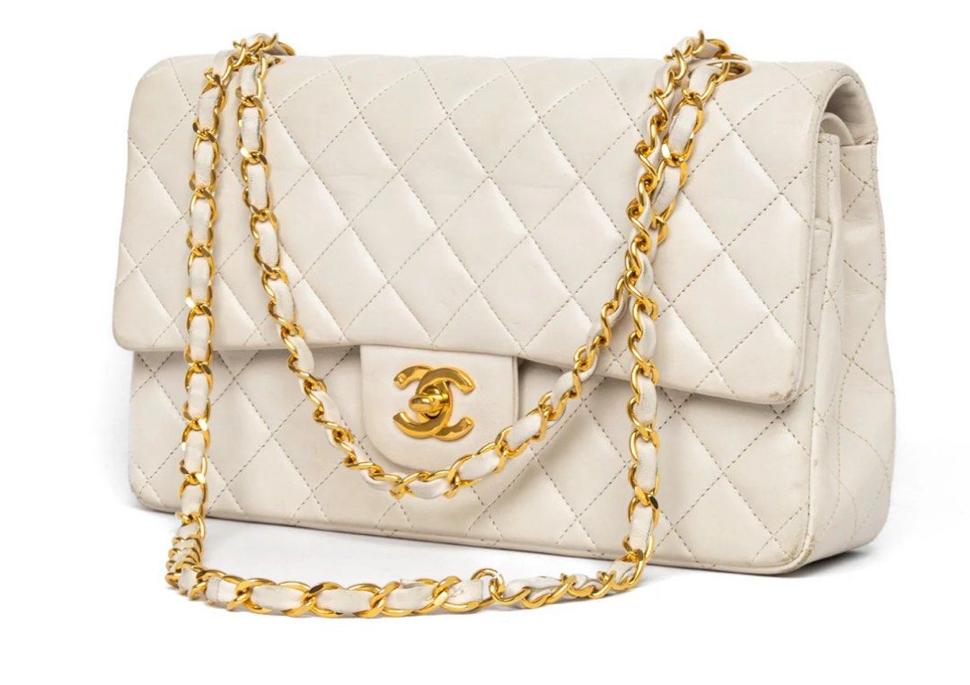 CHANEL MEDIUM CLASSIC DOUBLE FLAP OFF-WHITE (Category: Bags & Wallets) located in Singapore. Submitted by kmurrayy (Listing ID 1377811691, Image 2). Description: Like new, hardly used authentic Chanel bag for sale. Meet up Marina Bay..