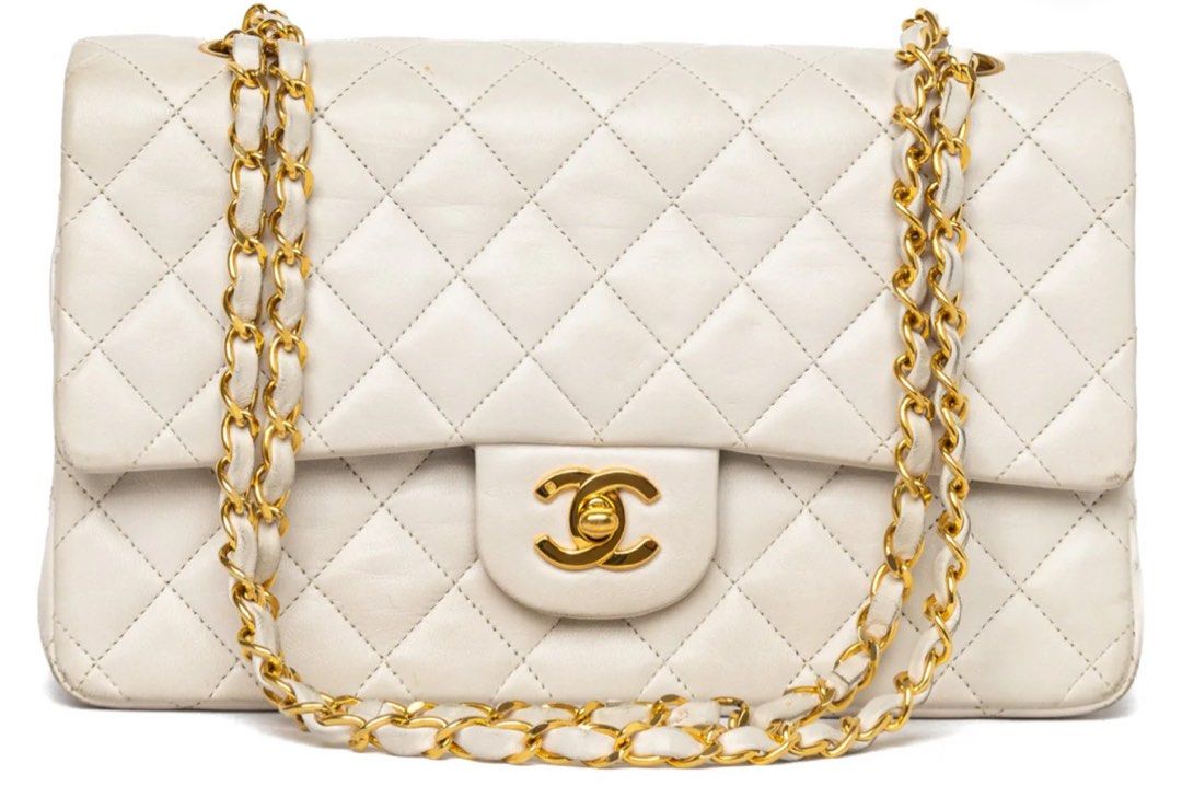CHANEL MEDIUM CLASSIC DOUBLE FLAP OFF-WHITE (Category: Bags & Wallets) located in Singapore. Submitted by kmurrayy (Listing ID 1377811691, Image 1). Description: Like new, hardly used authentic Chanel bag for sale. Meet up Marina Bay..