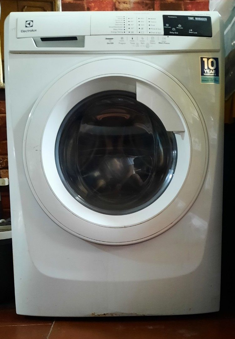 Electrolux Washing Machine (Category: Washing Machines and Dryers) located in Manila. Submitted by olxph_omar.1020 (Listing ID 1377795685, Image 1). Description: Washing is in working condition. Front load means its saves water. Tub is newly cleaned by Electrolux technician. Replaced with new motor and bearing. Issue: No Drying capabilities. Can be repaired according to service center and can be endorsed. Would only cost around 5k..
