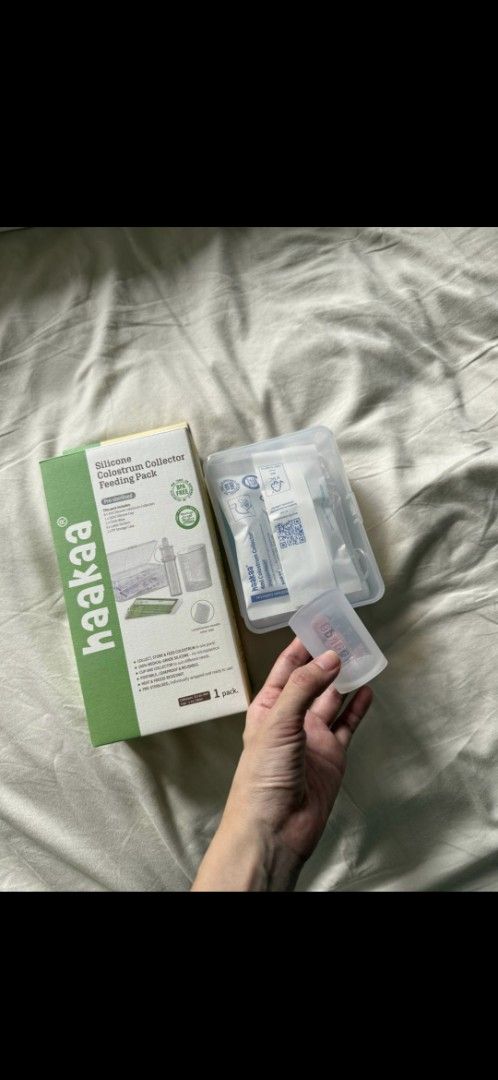 Haakaa Pre-Sterilized Silicone Colostrum Collector Feeding Pack (4ml x 6) (Category: Breastfeeding & Bottle Feeding) located in Singapore. Submitted by chenclaire00025 (Listing ID 1377769872, Image 1). Description: Haakaa Pre-Sterilized Silicone Colostrum Collector Feeding Pack (4ml x 6) Letting go at $15 Retail price: $45 6 x Colostrum Collectors (4ml) + 1 x Silicone Measuring & Feeding Cup + 6 x Label Stickers + 1 x cloth wipe + 1 x PP storage 