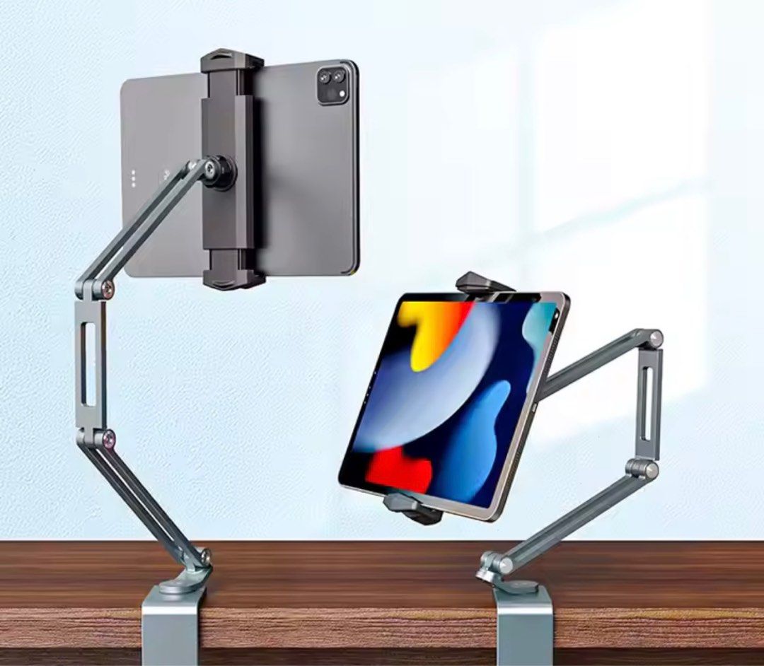 iPad / iPhone holder (Category: Laptop Bags & Sleeves) located in Singapore. Submitted by livingsustainably (Listing ID 1377863341, Image 3). Description: (High Quality - Aluminium Alloy) 360° Gooseneck Tablet & Phone Holder Stand Pick up only!.
