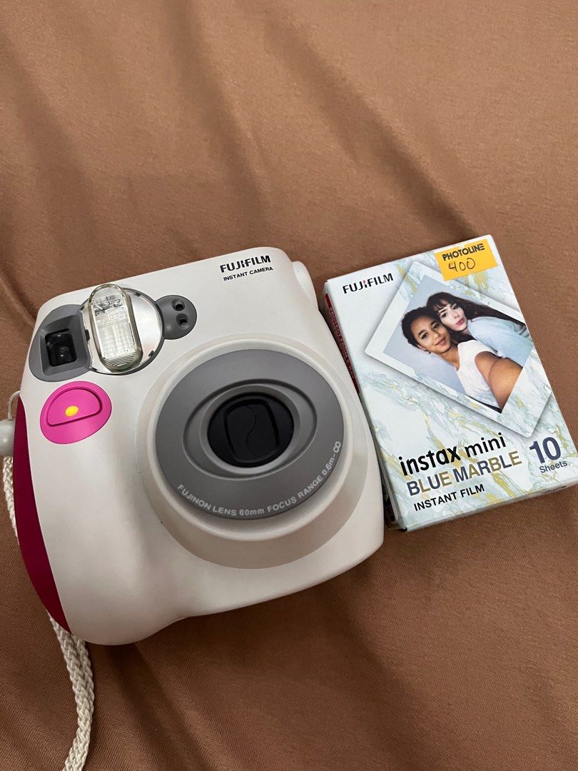 Instax Mini 7S (with free film) (Category: Cameras) located in Imus. Submitted by paulallelogram (Listing ID 1377823464, Image 1). Description: RFS: Decluttering Comes with free film (10 sheets).