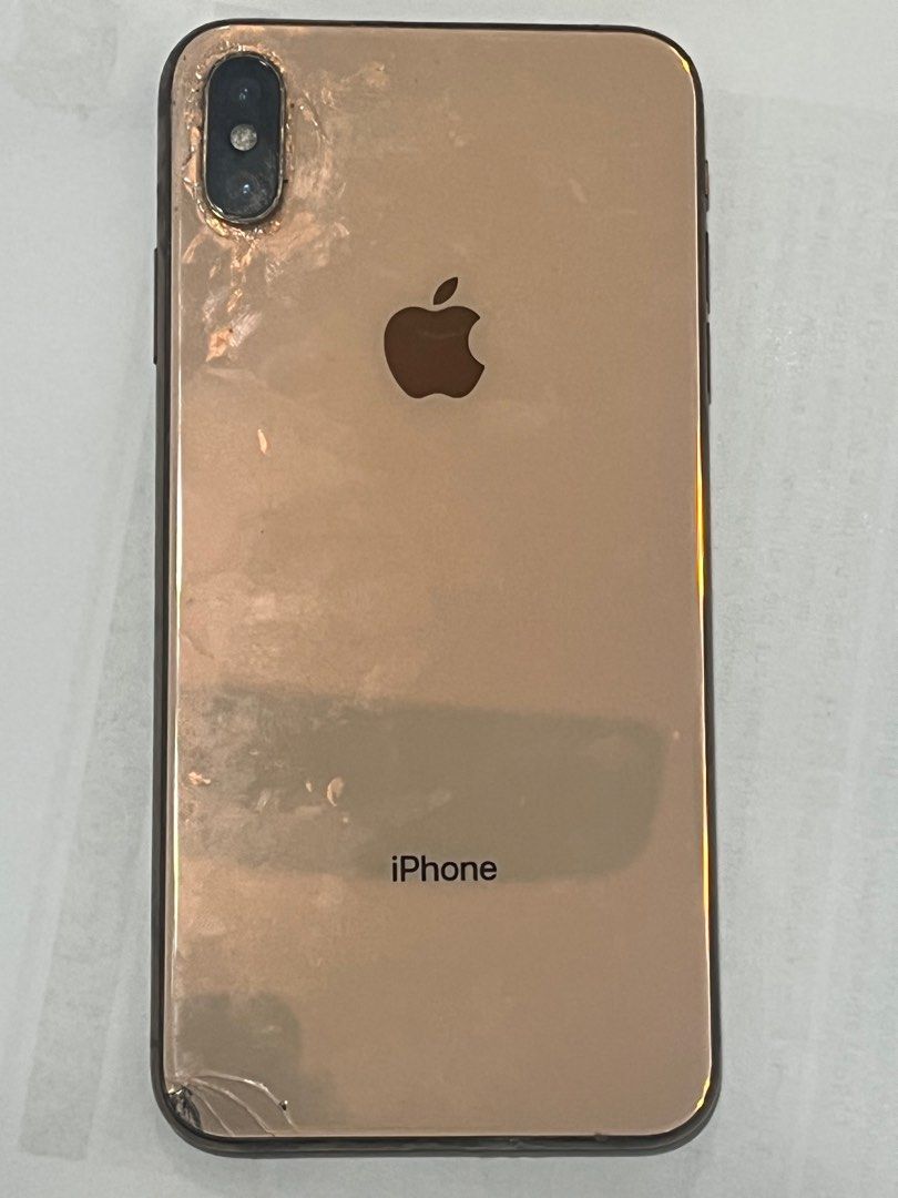 (Category: iPhone X Series) located in Singapore. Submitted by vintagemagica (Listing ID 1377898980, Image 3). Description: iPhone XS Max 64 GB - (back camera window has been repaired and works well) New Battery ( 3 rd Party) , Phone works perfectly , .