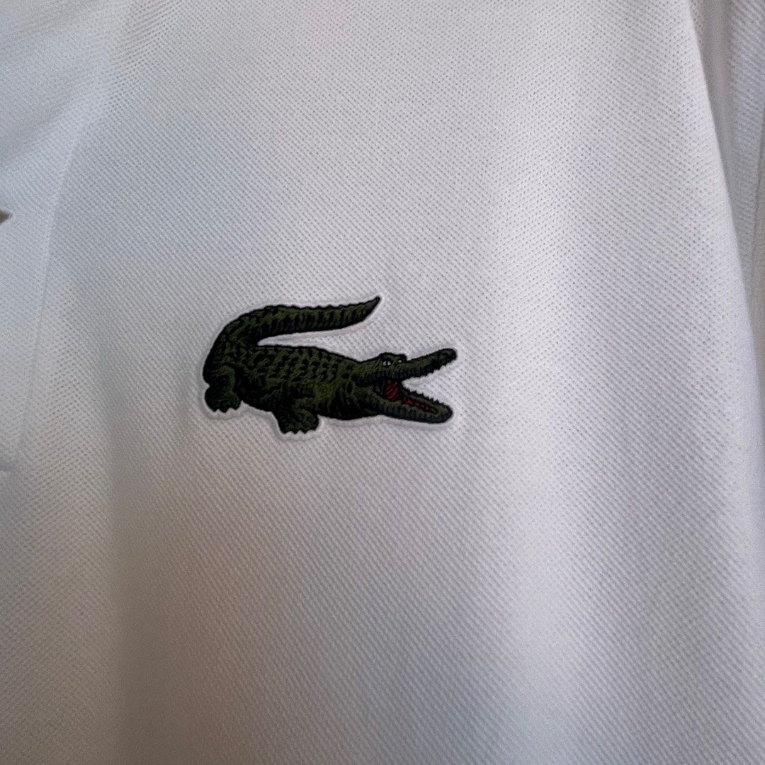 Lacoste Loose Fit White Polo Formal (Category: Tshirts & Polo Shirts ) located in Pasig City. Submitted by save_one (Listing ID 1377802595, Image 3). Description: Lacoste Loose Fit White Unisex Large .