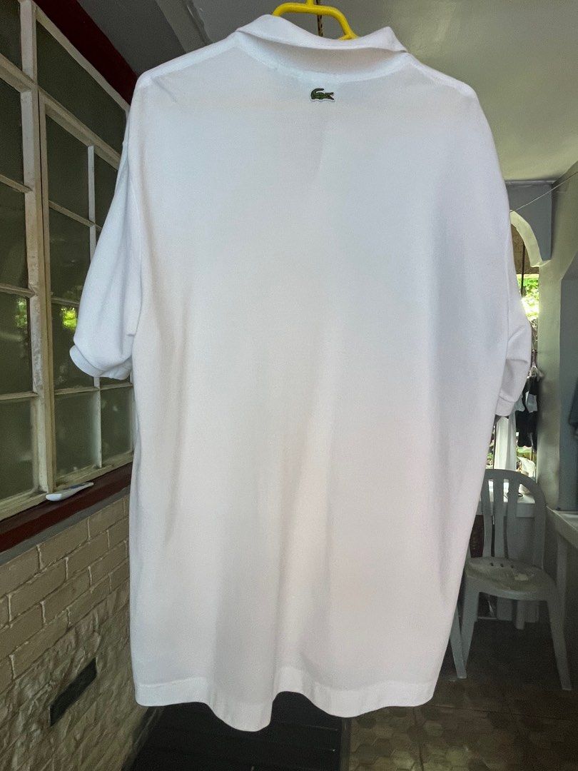 Lacoste Loose Fit White Polo Formal (Category: Tshirts & Polo Shirts ) located in Pasig City. Submitted by save_one (Listing ID 1377802595, Image 2). Description: Lacoste Loose Fit White Unisex Large .