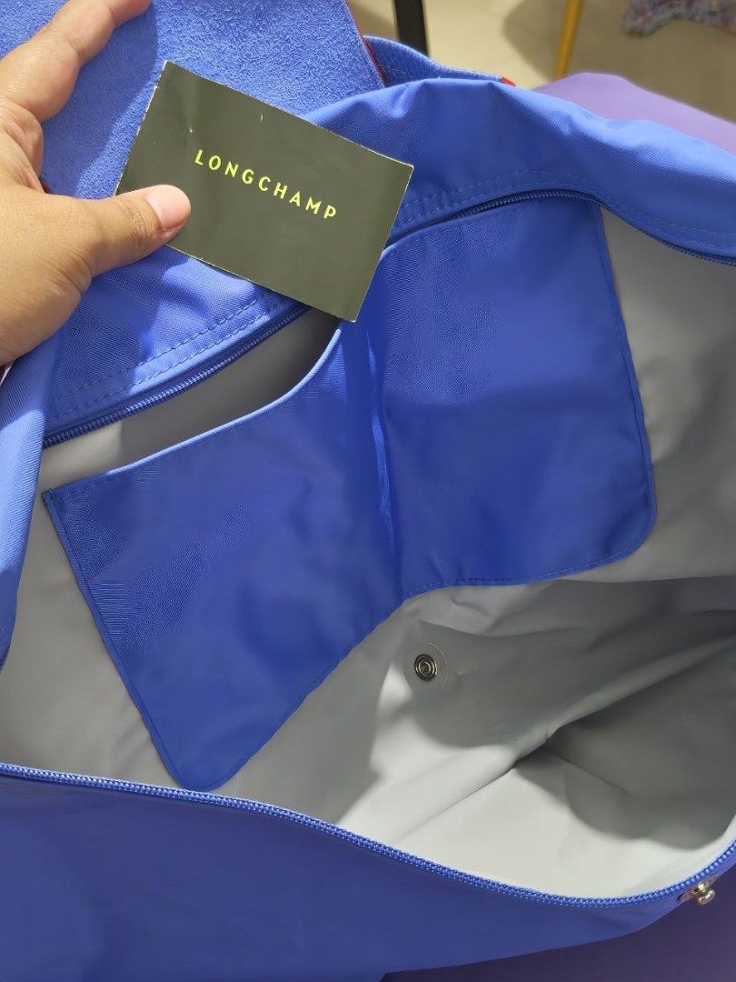 Authentic Longchamp Le Pliage Document Bag (Category: Luxury Bags & Wallets) located in Makati City. Submitted by yenpreloveditems (Listing ID 1377865122, Image 3). Description: Longchamp Le Pliage Document Bag 📍 Bought in Japan, received as a gift 👜 Used only twice – excellent condition, looks brand new 💰 Selling for ₱5,000 (slightly negotiable) Classic and practical, this authentic Longchamp Le Pliage document bag is perfect for work, school