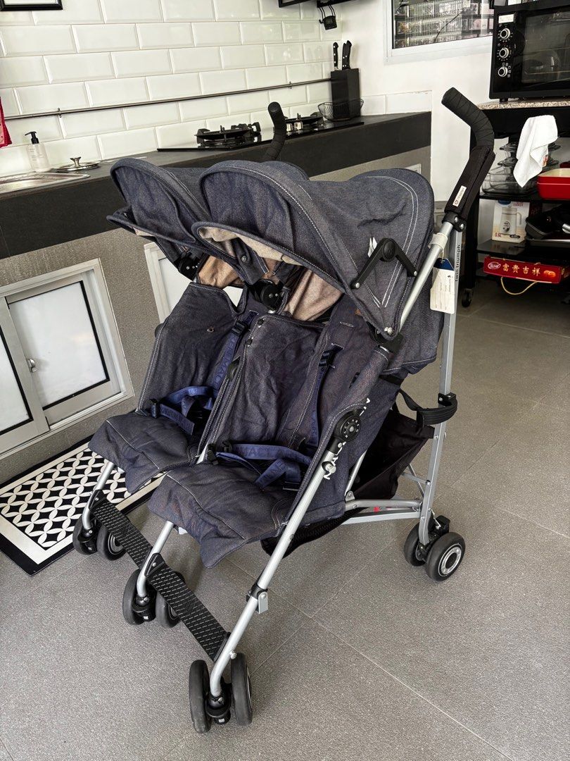 Maclaren Twin Triumph Stroller - Denim twin stroller (Category: Strollers) located in Singapore. Submitted by wolfman13 (Listing ID 1377791287, Image 1). Description: Maclaren Twin Triumph stroller in denim. Features individual sun canopies, reclining seats, and a compact fold for easy storage. Includes safety harnesses. Super hardy, it’s a maclaren! My 2nd maclaren pram! Easily flows to a compact size! Excellent perfect condition! Hardly used, a