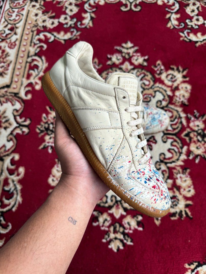 Maison Margiela GATs Paint Splatter Beige (Category: Sneakers) located in Quezon City. Submitted by jawnzslayer (Listing ID 1377789461, Image 2). Description: maison margiela gats paint splatter beige no box, pair only size 40 on tag fits 7-7.5 mens worn condition .