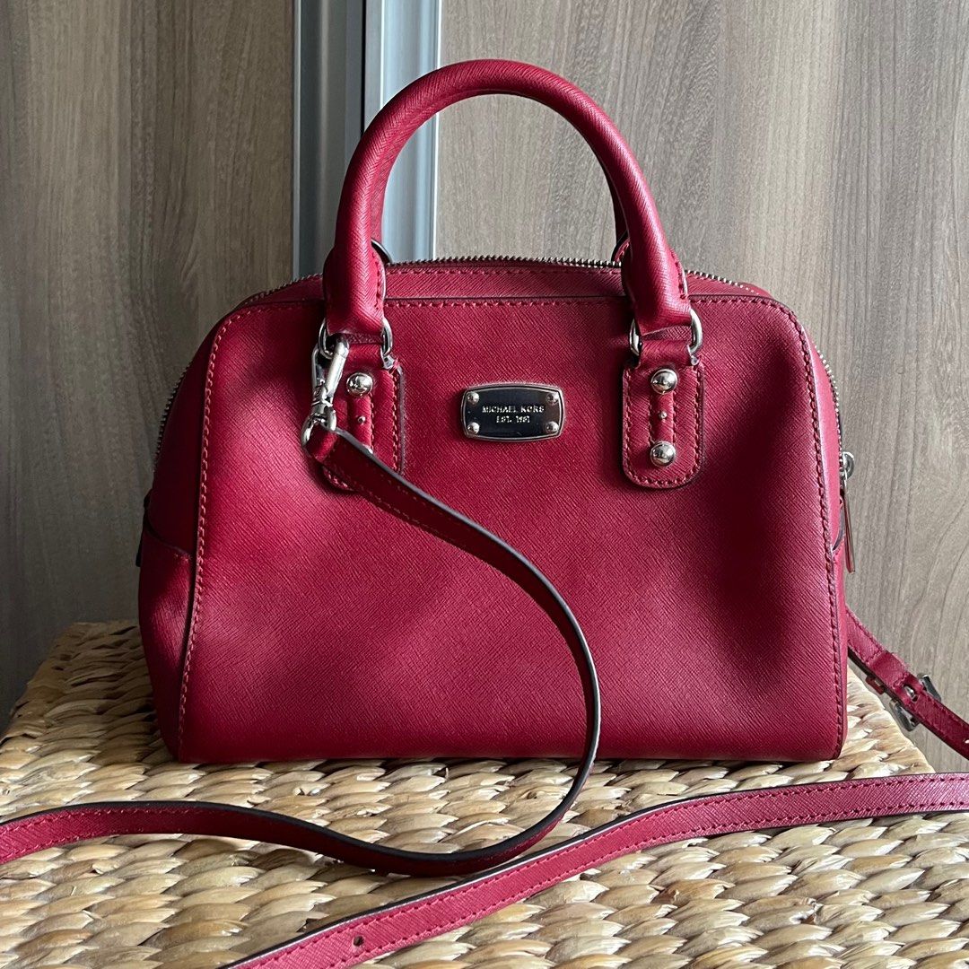 Michael Kors Handbag (w long strap) (Category: Luxury Bags & Wallets) located in Makati City. Submitted by 4635archives (Listing ID 1377813893, Image 1). Description: Michael Kors Red / Burgundy Handbag Comes with a long detachable strap Lightly used but please manage your expectations as this was stored for quite some time.