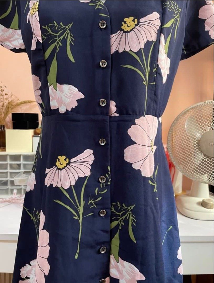 Navy Blue Floral Dress (Category: Dresses) located in Pasig City. Submitted by somedecluttering (Listing ID 1377779657, Image 3). Description: Large on Tag Working Buttons Double Lining length: 34 inches Sleeves Length: 7 inches Armpit to Armpit: 19 inches.