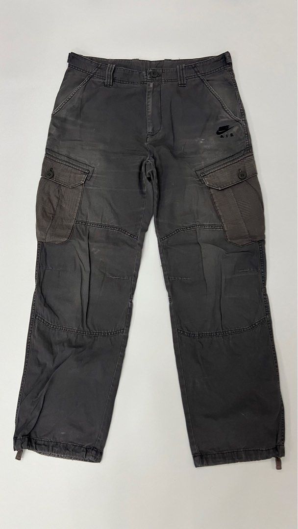Nike Cargo Pants (Category: Jeans) located in Tagbilaran City. Submitted by patrickwdfuller (Listing ID 1377818865, Image 1). Description: Measurements: Size: Large (fits up to 34”) Length: 42” Width: 17” Leg Opening: 9” Condition: Nice vintage fade. A couple small pinholes on front (adds to the vintage vibe). Missing button on left back pocket. Other than that, no other flaws .