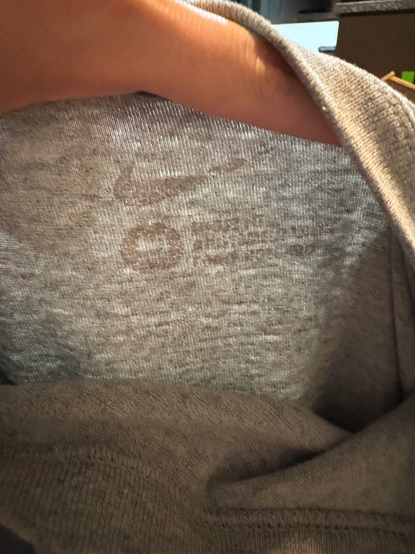 Nike Soccer T-Shirt - Grey (Category: Tshirts & Polo Shirts) located in Singapore. Submitted by domroz (Listing ID 1377773821, Image 2). Description: Vintage 2000s Grey Nike soccer t-shirt. Features the Nike logo and the word "SOCCER" on the back. Made of a comfortable fabric. Great for casual wear or sports activities..