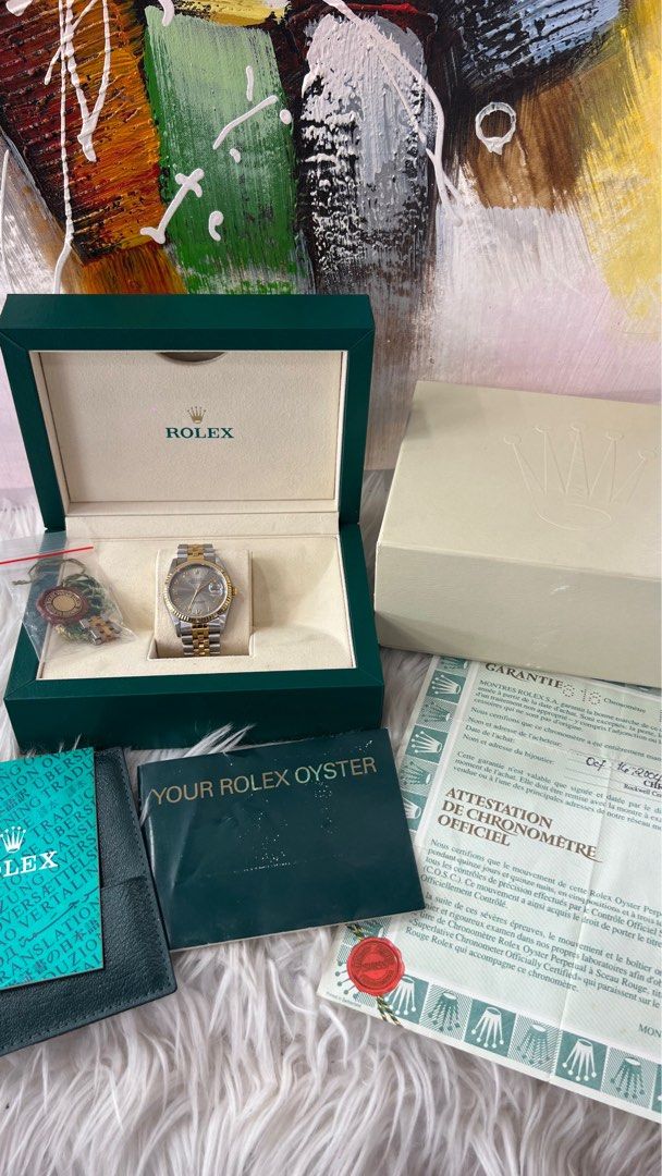 Original Rolex Datejust OP Two Tone 36mm (Category: Luxury Watches) located in Paranaque City. Submitted by glenjonluxuryfinds2 (Listing ID 1377942247, Image 2). Description: Year 2004 36mm With box and certificate .