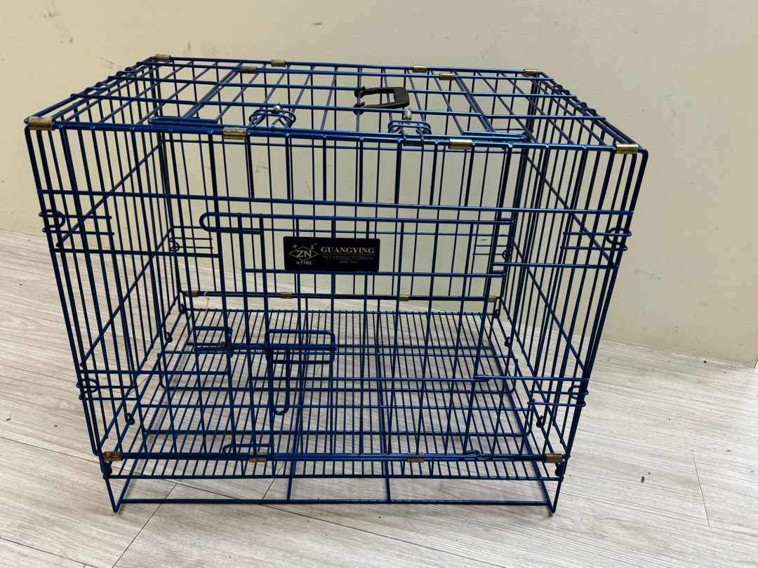 Pet cage (Category: Homes & Other Pet Accessories) located in Singapore. Submitted by i_mall4u (Listing ID 1377802783, Image 2). Description: Pet cage. Can be small dog 🐕 or cat🐈‍⬛ or Rabbit🐇. Dimension: H520mm x W615mm x D430mm. Come with handle. Steel cage. Portable and can be folded for easy storage..