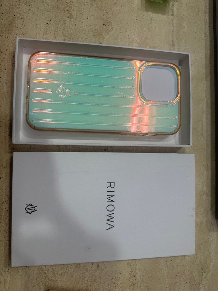 Rimowa iphone 14 promax case (Category: iPhone 14 Series) located in Manila. Submitted by _tala_17 (Listing ID 1377942031, Image 2). Description: Good condition no issue.