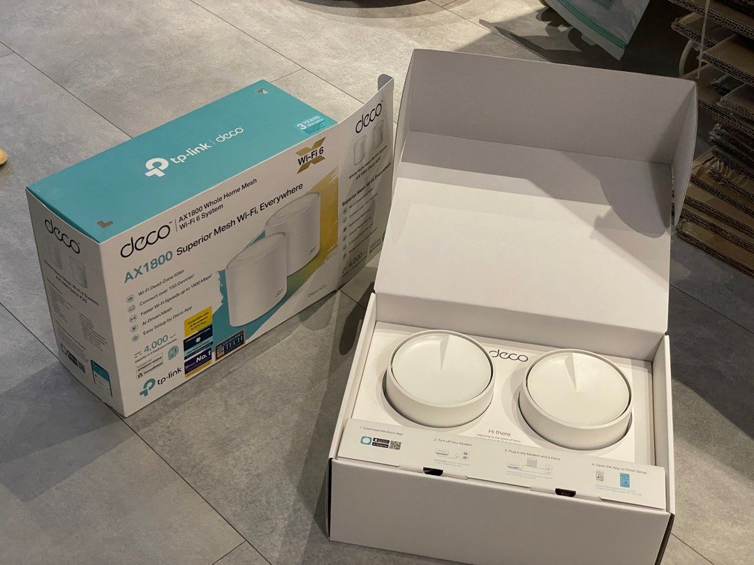 TP-Link Deco AX1800 Whole Home Mesh Wi-Fi 6 System (Category: Networking) located in Singapore. Submitted by m6xjp6 (Listing ID 1377944179, Image 2). Description: TP-Link Deco AX1800 Wi-Fi 6 mesh system with box. Condition like new. Provides superior Wi-Fi coverage for up to 4,000 sq. ft. and supports over 150 devices. Easy setup via the Deco app. Includes two units..