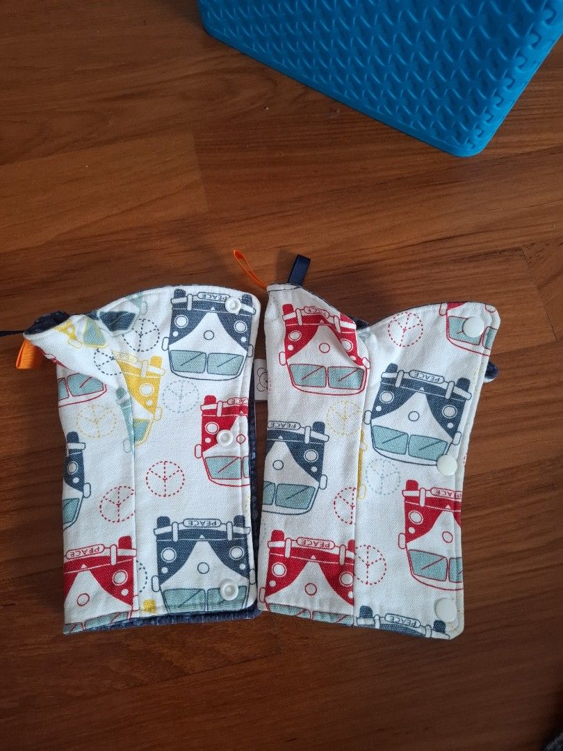 Tula bib teether guard - Reversible Design (Category: Babies & Kids Fashion) located in Singapore. Submitted by plumbum (Listing ID 1377836622, Image 2). Description: - Reversible tula saliva bib guard - Features: Blue polka dot pattern & cute car design - Secure snap closure - will throw in a free spare. lost the other side but good to rotate in the wash!.