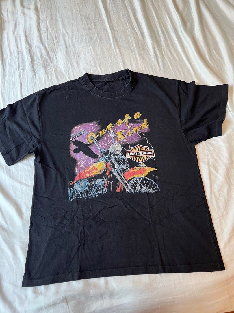 Vintage Graphic Harley Davidson Shirt (Category: Tshirts & Polo Shirts) located in Singapore. Submitted by tinstertin (Listing ID 1377842061, Image 3). Description: No shirt tag, thus lowered price. Black Harley Davidson Shirt with Retro Print. PTP: 21inch Length: 28inch NO NEGO.