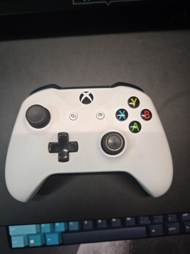 Xbox Controller (Category: Xbox) located in Singapore. Submitted by hm2222 (Listing ID 1377905627, Image 1). Description: no box no cable. just the controller only working 100% fine. RT LT key abit sticky maybe can remove the rubber padding will be fine.