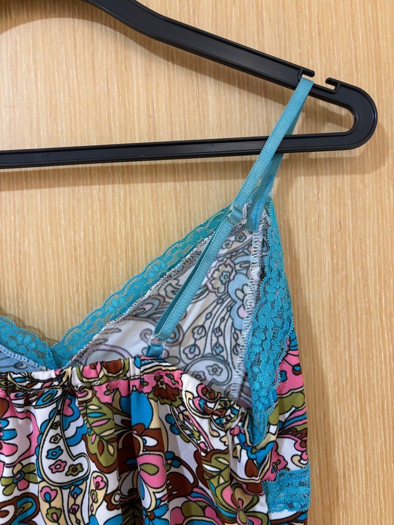 Y2K Floral Camisole with Lace Trim (Category: Sleeveless) located in Singapore. Submitted by havenhague (Listing ID 1377800458, Image 2). Description: - funky colourful floral print and delicate blue lace trim - adjustable spaghetti straps Y2K funky boho camisole cami thrift 80s 70s retro vintage 2000s noughties tank sleeveless bohemian hippie.