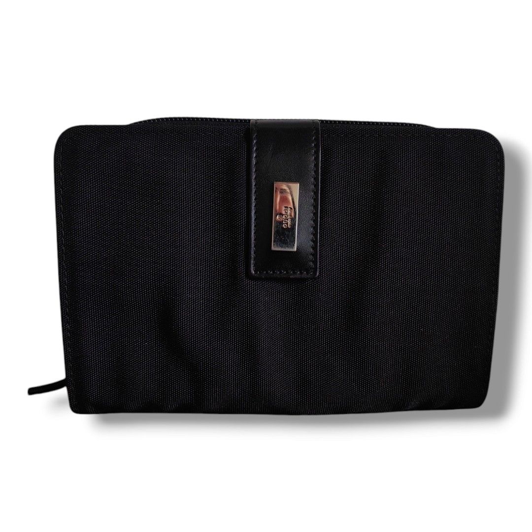 Authentic GUCCI Agenda compact (Category: Luxury Bags & Wallets) located in Quezon City. Submitted by maneradesignersboutique (Listing ID 1372953601, Image 1). Description: SALE SALE SALE❗❗❗ Money back Guarantee 💯% Authentic *Brand: GUCCI AGENDA Compact Wallet *Materials: Nylon leather trim *Color: balck *Size: medium *Condition: 8/10 never been spa no damage -Used * Inclusions: AGENDA ONLY Open for LAYAWAY 20% down payment 80% payable in 60 - 9