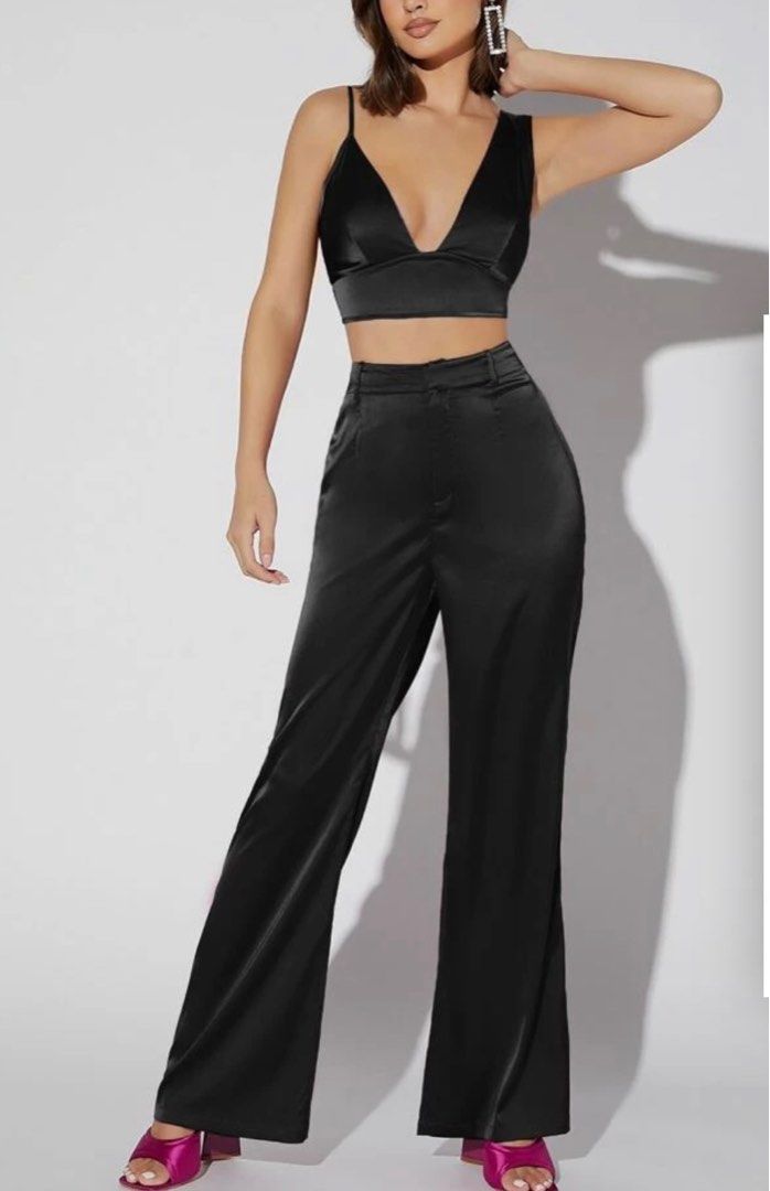 Black silk coordinates (Category: Sets or Coordinates) located in Pasig City. Submitted by closetcleanoutmnl (Listing ID 1373043199, Image 2). Description: Black silk coordinates Crop top Zipper at the back Adjustable strap Size: medium.