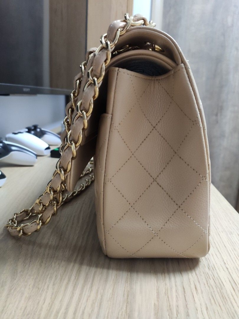 Chanel Classic 27 Beige Shoulder Bag in Caviar Gold Hardware (Category: Bags & Wallets) located in Singapore. Submitted by cyck323 (Listing ID 1372956002, Image 3). Description: Chanel Classic 27 Beige Shoulder Bag in Caviar Gold Hardware **Authenticity Card + Receipt + Box All Available ** Mint Condition Free Delivery If meet up can be Wheelock Place.