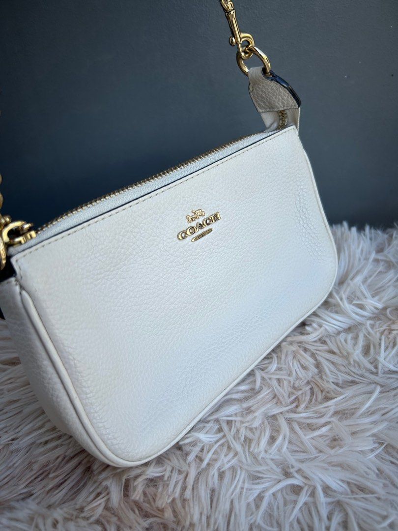 COACH Pochette Leather Kili Bag (Category: Luxury Bags & Wallets) located in Pasig City. Submitted by angelsluxe.mnl (Listing ID 1372867327, Image 2). Description: Money back guaranteed authentic. Almost new condition.