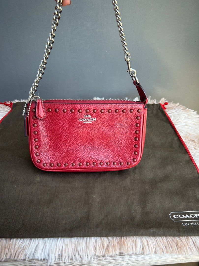 COACH Pochette Leather Kili Bag (Category: Luxury Bags & Wallets) located in Pasig City. Submitted by angelsluxe.mnl (Listing ID 1372867551, Image 2). Description: Money back guaranteed authentic. Almost new condition.