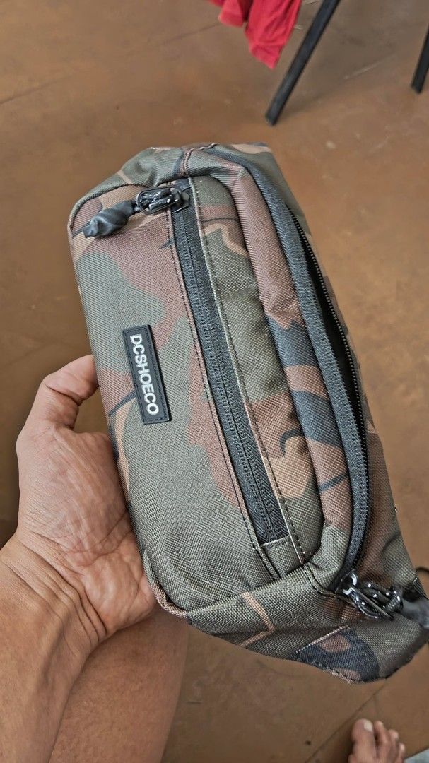 DC Tussler Camouflage (Category: Luxury Bags & Wallets) located in Makati City. Submitted by _nas03 (Listing ID 1372897455, Image 1). Description: DC Tussler Belt Bag 988 meetups 1000 freeship.