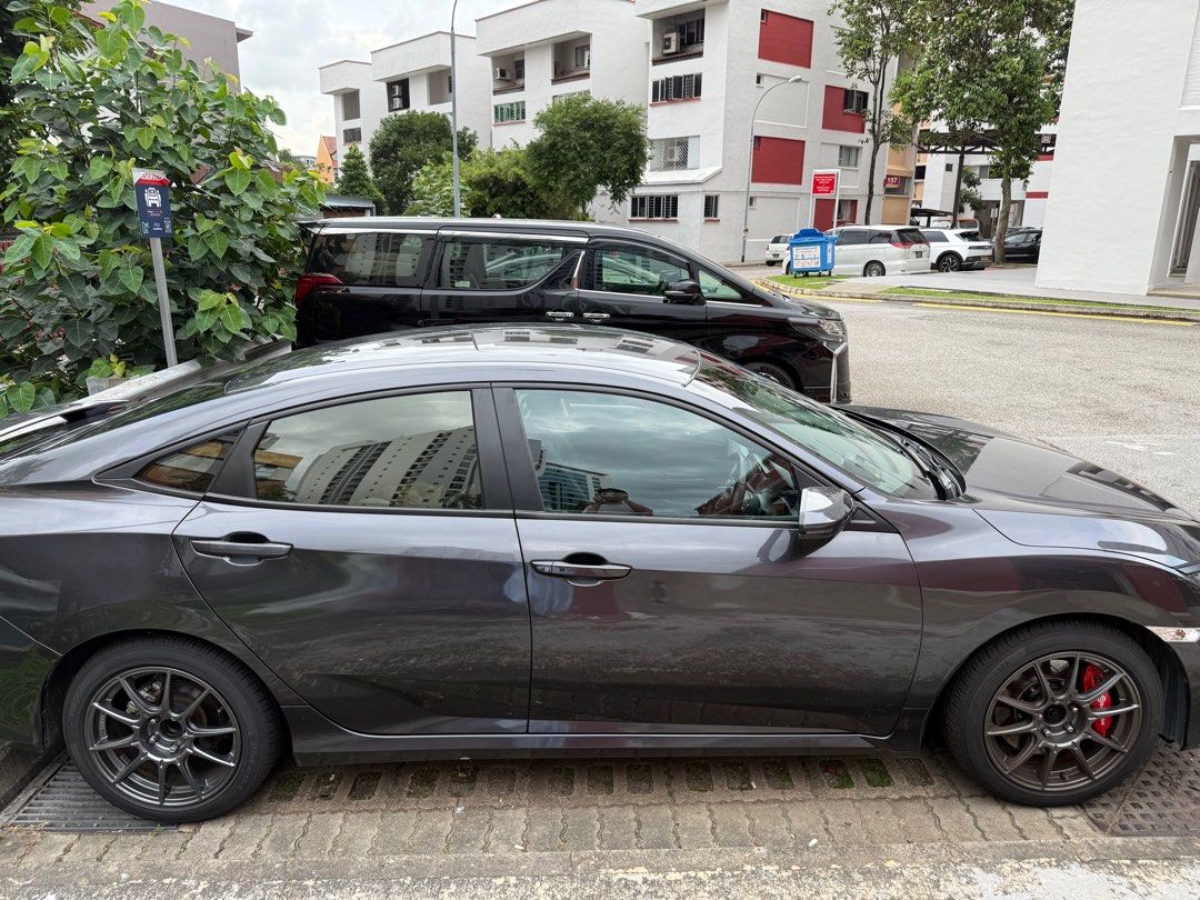 Honda Civic 1.6 i-VTEC (A) (Category: Used Cars) located in Singapore. Submitted by artkit (Listing ID 1372866887, Image 2). Description: 2018 Honda Civic 1.6A VTi Low Mileage 3 years remaining. Vehicle details: Engine - 1.6 L i VTEC Transmission - CVT automatic Exterior - dark grey Interior - clean, well maintained leather seats Condition - accident free, non-smoker driver, always parked under MSPC Add on: New 17 inch SSR rims and Yokohama tyres