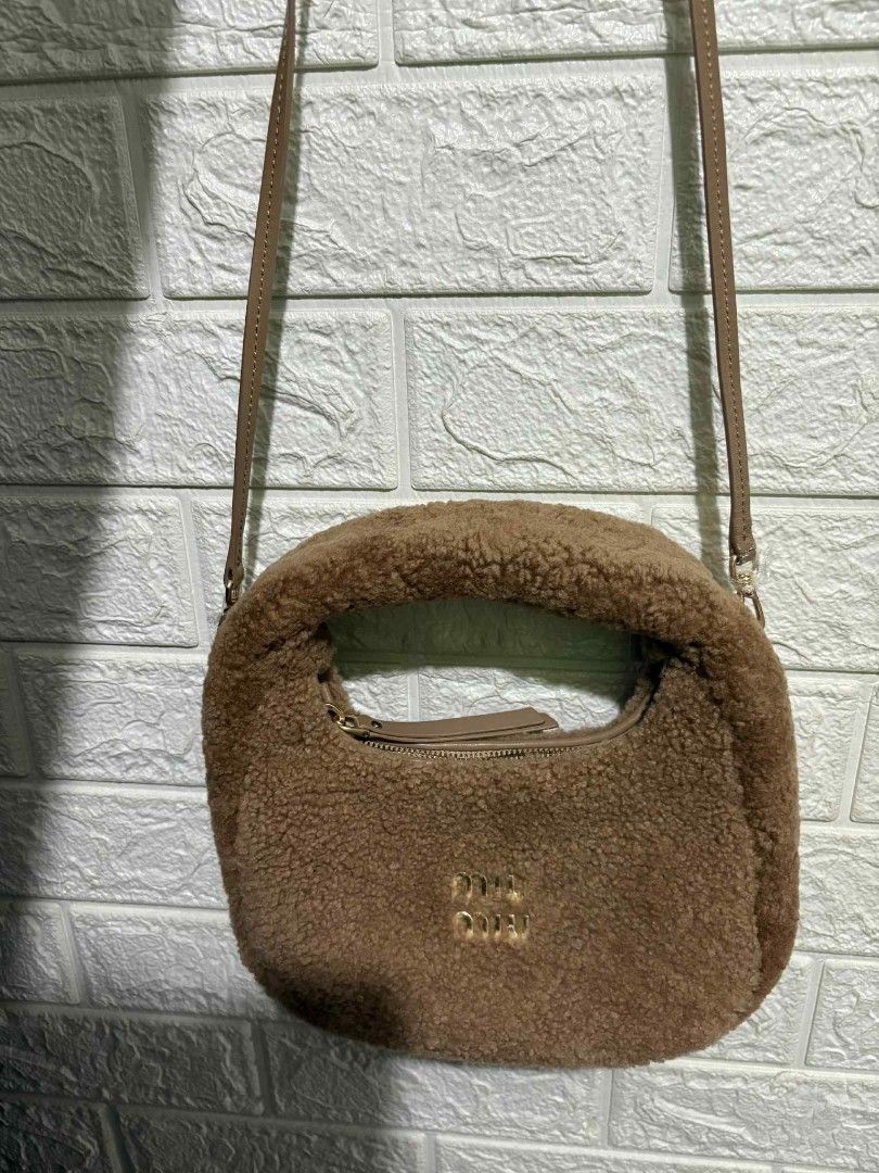 Super Sale Miu miu two way (Category: Cross-body Bags) located in Manila. Submitted by bagelyaniellen (Listing ID 1372860317, Image 2). Description: Miu miu two way, comes with dustbag only. Really cute in actual and it can fit medium wallet promax etc... PM me for details..