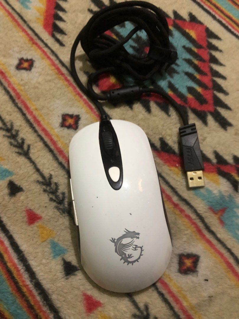 MSI DS102 V2RGB wired mouse (Category: Mouse & Mousepads) located in Quezon City. Submitted by markgolveo (Listing ID 1372949711, Image 2). Description: MSI DS102 V2RGB wired mouse Signs of wears All is working good buttons and scroll wheel Good working all features and lights DPi works well.