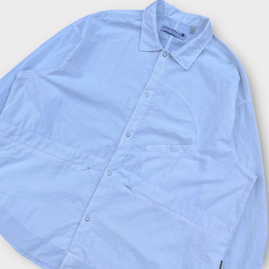 OVERALL - White Multipocket Boxy Utility Long Sleeve Shirt (Category: Activewear) located in Los Banos. Submitted by declutterking (Listing ID 1373043459, Image 3). Description: Size Large on tag Dimensions: 22" shoulders 27" chest 28" length 23" sleeves Good as new condition Authentic.