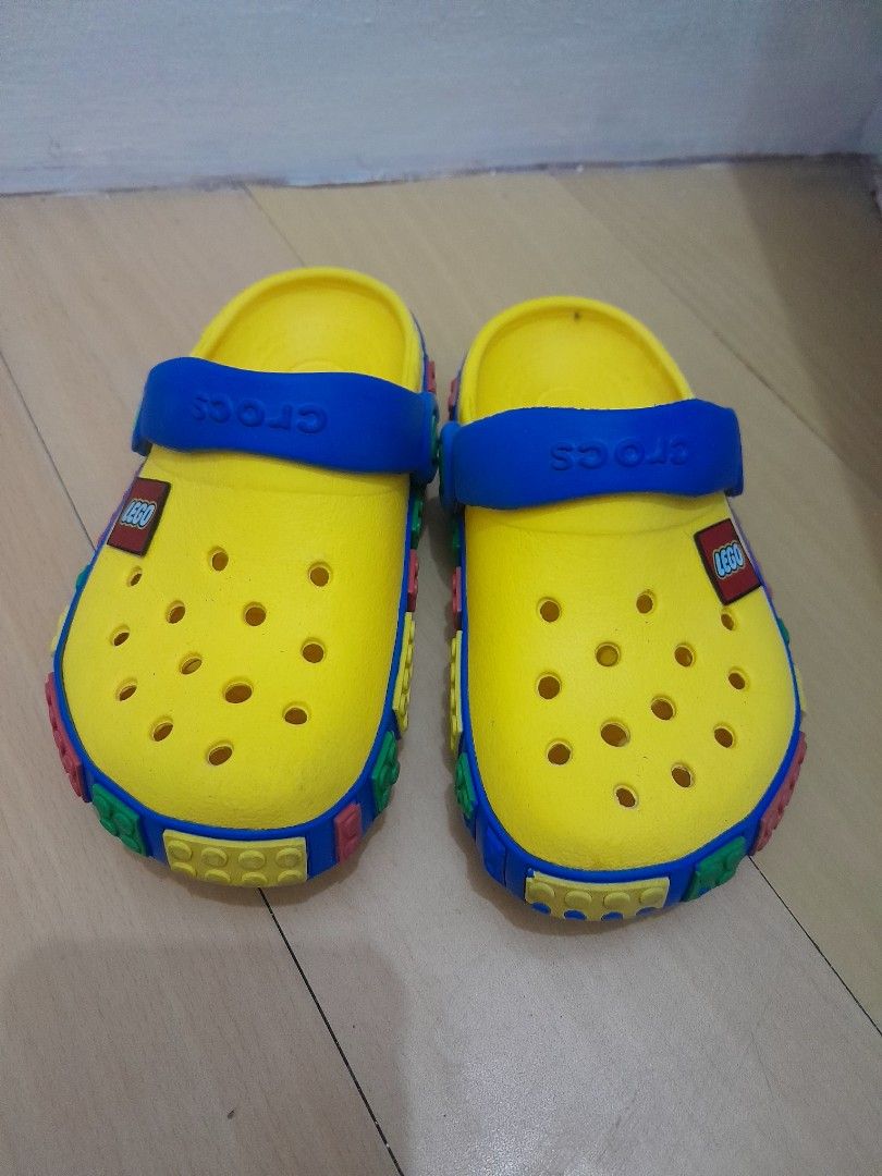 Preloved Crocs Lego Clogs kids Yellow (Category: Babies & Kids Fashion) located in Cavite. Submitted by Aiasclosetph (Listing ID 1373023869, Image 1). Description: in good condtion size C8 obvious heel drag only.