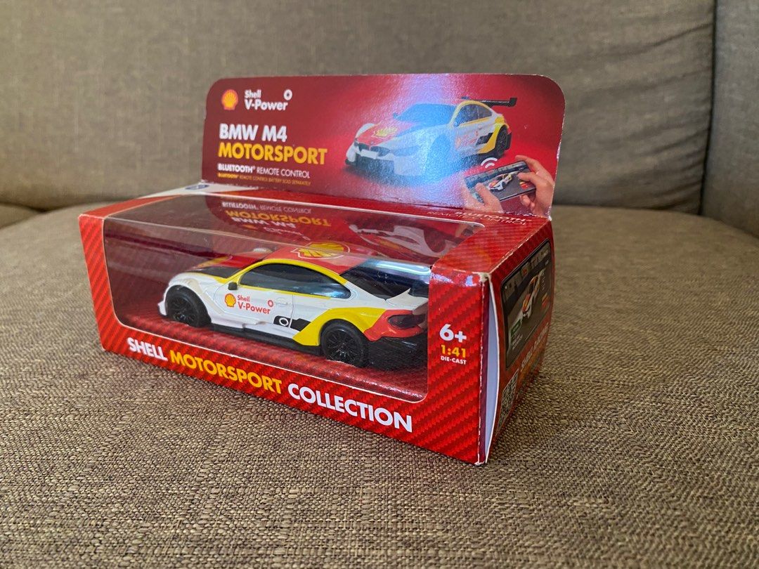 Shell Motorsport Collection BMW M4 Remote Control (Category: Vehicle & Diecast Models) located in Tuguegarao City. Submitted by arkistudent (Listing ID 1372943637, Image 3). Description: The Shell Motorsport Collection of Bluetooth remote controlled cars is a global promotion to drive Shell retail sales which first launched in 7 countries within the Central Eastern Europe region. The Bluetooth Remote Controlled cars could be driven using the Shel