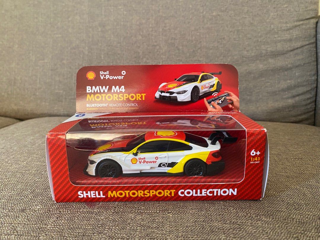 Shell Motorsport Collection BMW M4 Remote Control (Category: Vehicle & Diecast Models) located in Tuguegarao City. Submitted by arkistudent (Listing ID 1372943637, Image 1). Description: The Shell Motorsport Collection of Bluetooth remote controlled cars is a global promotion to drive Shell retail sales which first launched in 7 countries within the Central Eastern Europe region. The Bluetooth Remote Controlled cars could be driven using the Shel