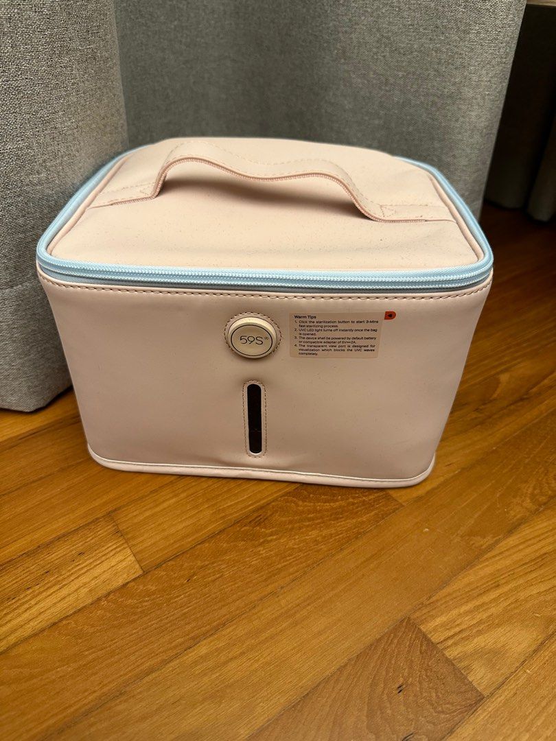 59s portable sterilizer (Category: Breastfeeding & Bottle Feeding) located in Singapore. Submitted by oparadise (Listing ID 1373205505, Image 1). Description: Comes with a power bank Sterilizer only used to sterilize baby bottles and pacifier Not heavily used as we bought it only for a short trip but has not travelled since..