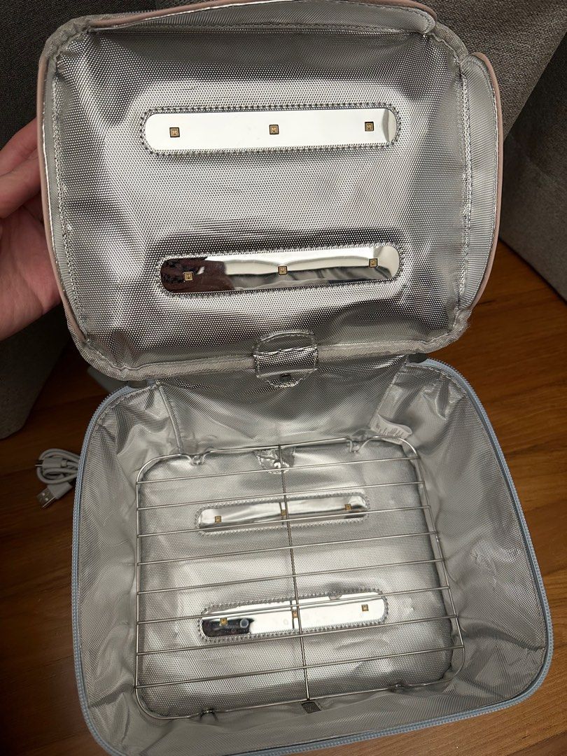 59s portable sterilizer (Category: Breastfeeding & Bottle Feeding) located in Singapore. Submitted by oparadise (Listing ID 1373205505, Image 3). Description: Comes with a power bank Sterilizer only used to sterilize baby bottles and pacifier Not heavily used as we bought it only for a short trip but has not travelled since..