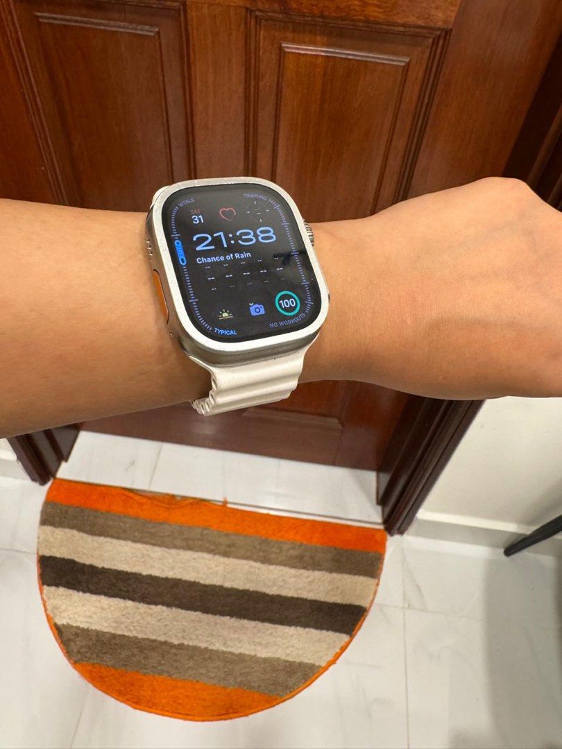 Apple Watch Ultra (Category: Wearables & Smart Watches) located in Singapore. Submitted by mysticblossom11 (Listing ID 1373141716, Image 3). Description: Apple Watch Ultra, 49 mm + ocean band white (original apple) + sports band grey (original Apple) + tempered glass on dial + charging cable .