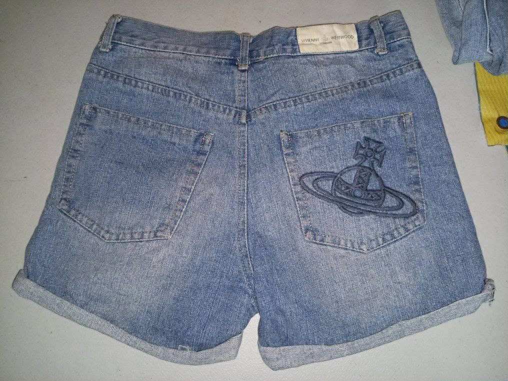 Authentic Vivienne Westwood Denim Shorts (Category: Shorts) located in Makati City. Submitted by costarlight (Listing ID 1373222308, Image 1). Description: Authentic Waist size 28 High Waist Negotiable Design: Icon button and embroidery details Ripped design; Pearl studs with strong metal attachment.
